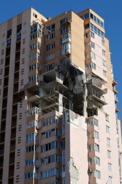 KYIV, UKRAINE, MAY 11, 2022: Russian missile damaged multi-storey dwelling building in Kiev city on February 26, 2022. Russian aggression. War in Ukraine. Terror and genocide of Ukrainian people