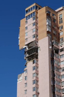 KYIV, UKRAINE, MAY 11, 2022: Russian missile damaged multi-storey dwelling building in Kiev city on February 26, 2022. Russian aggression. War in Ukraine. Terror and genocide of Ukrainian people