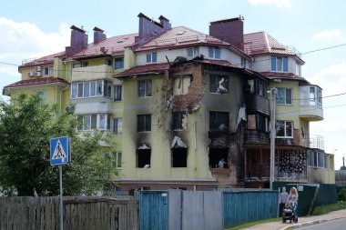 BUCHA, UKRAINE, JUNE 8, 2022: War in Ukraine. Russian army of terrorist and marauders damaged dwelling house in Bucha, Kyiv Region on March 2022. After bombing. Terror and genocide of Ukrainian people