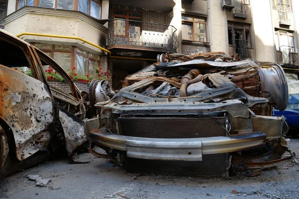 IRPIN, UKRAINE, JUNE 6, 2022: After bombing. Russian terrorist army burned cars, dwelling houses and killed people in Irpin town, Kyiv Oblast on March 2022. Terror and genocide of Ukrainian people