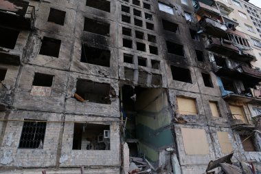 KYIV, UKRAINE, APRIL 15, 2022: After bombing. Russian terrorist army destroyed by shell dwelling house on Obolon district in Kyiv on March 2022. War in Ukraine. Terror and genocide of Ukrainian people