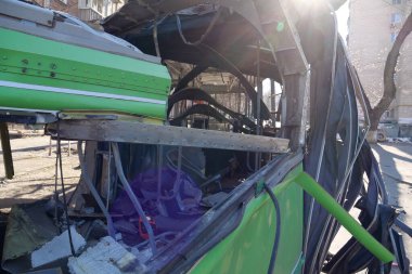 KYIV, UKRAINE, MARCH 20, 2022: After bombing. War in Ukraine. Russian missile destroyed trolleybus in Kyiv city on March 14, 2022. Terror and genocide of Ukrainian people