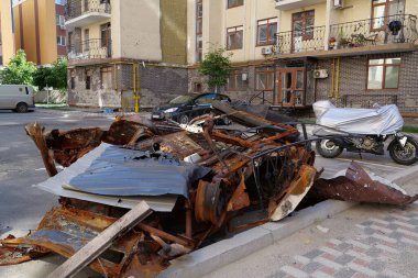 IRPIN, UKRAINE, JUNE 6, 2022: After bombing. Russian terrorist army burned cars, dwelling houses and killed people in Irpin town, Kyiv Oblast on March 2022. Terror and genocide of Ukrainian people