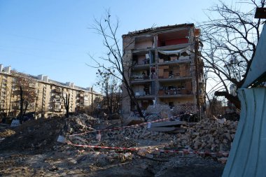 KYIV, UKRAINE, MARCH 20, 2022: After bombing. Russian terrorist army dropped missile and destroyed house in residential district in Kyiv city on March 18, 2022. Terror and genocide of Ukrainian people
