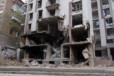 KYIV, UKRAINE, APRIL 29, 2022: After bombing. Dwelling house destroyed by russian missile in Kyiv city on end of April 2022. Russian aggression. War in Ukraine. Terror and genocide of Ukrainian people