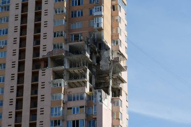 KYIV, UKRAINE, MAY 11, 2022: Russian missile damaged multi-storey dwelling building in Kiev city on February 26, 2022. Russian aggression. War in Ukraine. Terror and genocide of Ukrainian people