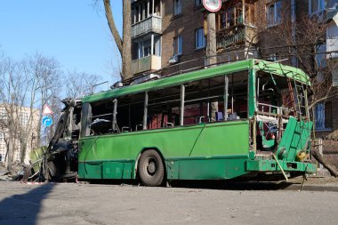 KYIV, UKRAINE, MARCH 20, 2022: After bombing. War in Ukraine. Russian missile destroyed trolleybus in Kyiv city on March 14, 2022. Terror and genocide of Ukrainian people