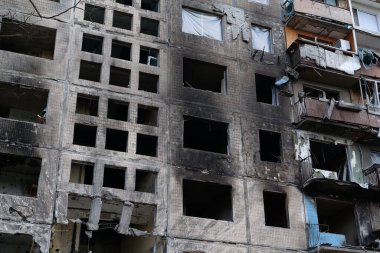 KYIV, UKRAINE, APRIL 15, 2022: After bombing. Russian terrorist army destroyed by shell dwelling house on Obolon district in Kyiv on March 2022. War in Ukraine. Terror and genocide of Ukrainian people