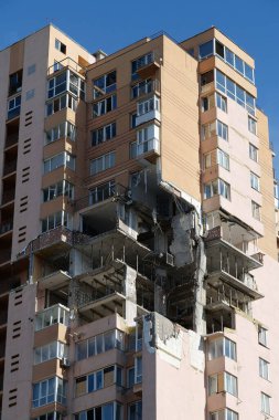 KYIV, UKRAINE, MAY 11, 2022: Russian missile damaged multi-storey dwelling building in Kiev city on February 26, 2022. Russian aggression. War in Ukraine. Terror and genocide of Ukrainian people