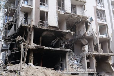 KYIV, UKRAINE, APRIL 29, 2022: After bombing. Dwelling house destroyed by russian missile in Kyiv city on end of April 2022. Russian aggression. War in Ukraine. Terror and genocide of Ukrainian people