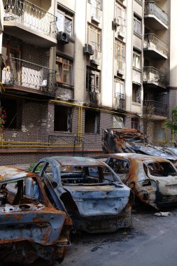 IRPIN, UKRAINE, JUNE 6, 2022: After bombing. Russian terrorist army burned cars, dwelling houses and killed people in Irpin town, Kyiv Oblast on March 2022. Terror and genocide of Ukrainian people