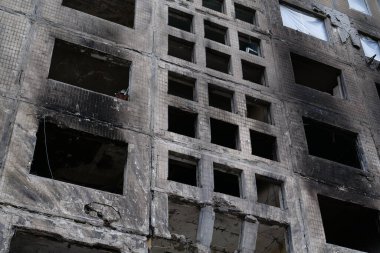 KYIV, UKRAINE, APRIL 15, 2022: After bombing. Russian terrorist army destroyed by shell dwelling house on Obolon district in Kyiv on March 2022. War in Ukraine. Terror and genocide of Ukrainian people