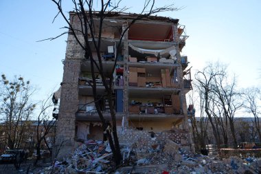 KYIV, UKRAINE, MARCH 20, 2022: After bombing. Russian terrorist army dropped missile and destroyed house in residential district in Kyiv city on March 18, 2022. Terror and genocide of Ukrainian people