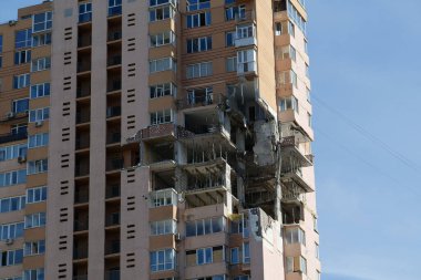 KYIV, UKRAINE, MAY 11, 2022: Russian missile damaged multi-storey dwelling building in Kiev city on February 26, 2022. Russian aggression. War in Ukraine. Terror and genocide of Ukrainian people