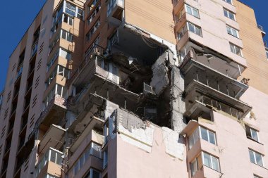 KYIV, UKRAINE, MAY 11, 2022: Russian missile damaged multi-storey dwelling building in Kiev city on February 26, 2022. Russian aggression. War in Ukraine. Terror and genocide of Ukrainian people