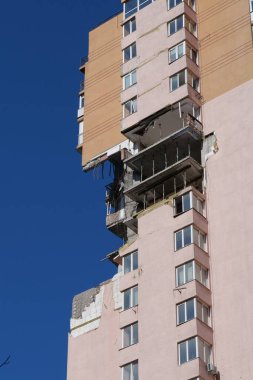KYIV, UKRAINE, MAY 11, 2022: After bombing. War in Ukraine. Terror and genocide of Ukrainian people. Russian terrorists damaged by missile dwelling house in Kyiv on end of February 2022