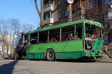 KYIV, UKRAINE, MARCH 20, 2022: After bombing. War in Ukraine. Russian missile destroyed trolleybus in Kyiv city on March 14, 2022. Terror and genocide of Ukrainian people