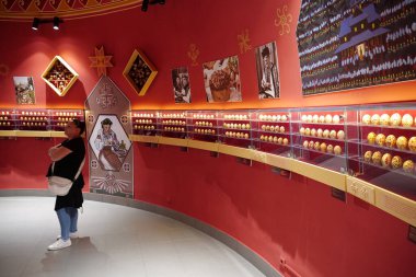 KOLOMYIA, UKRAINE, AUGUST 20, 2022: People inside Pysanka Museum, painted Easter egg, which is part of National Museum of Hutsulshchyna and Pokuttya Folk Art, western Ukrainian city of Kolomyia