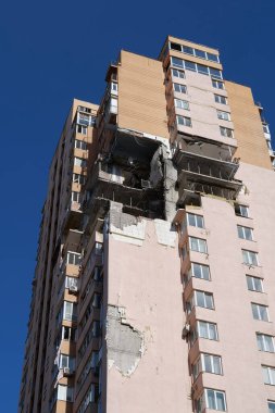 KYIV, UKRAINE, MAY 11, 2022: After bombing. War in Ukraine. Terror and genocide of Ukrainian people. Russian terrorists damaged by missile dwelling house in Kyiv on end of February 2022