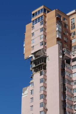 KYIV, UKRAINE, MAY 11, 2022: Russian missile damaged multi-storey dwelling building in Kiev city on February 26, 2022. Russian aggression. War in Ukraine. Terror and genocide of Ukrainian people