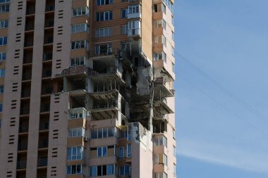 KYIV, UKRAINE, MAY 11, 2022: Russian missile damaged multi-storey dwelling building in Kiev city on February 26, 2022. Russian aggression. War in Ukraine. Terror and genocide of Ukrainian people