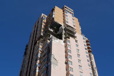 KYIV, UKRAINE, MAY 11, 2022: Russian missile damaged multi-storey dwelling building in Kiev city on February 26, 2022. Russian aggression. War in Ukraine. Terror and genocide of Ukrainian people