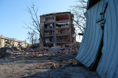 UKRAINE, KYIV, MARCH 20, 2022: Russian missile destroyed houses and garages in residential area in Kyiv city on March 18, 2022. After bombing, war in Ukraine, terror and genocide of Ukrainian people