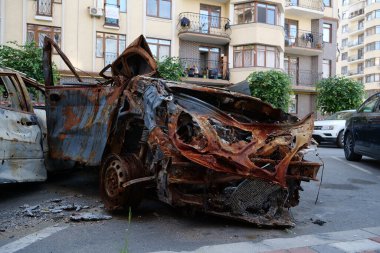 IRPIN, UKRAINE, JUNE 6, 2022: After bombing. Russian terrorist army burned cars, dwelling houses and killed people in Irpin town, Kyiv Oblast on March 2022. Terror and genocide of Ukrainian people