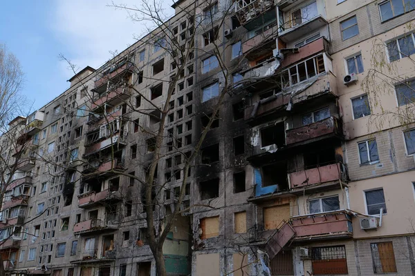 KYIV, UKRAINE, APRIL 15, 2022: After bombing. Russian terrorist army destroyed by shell dwelling house on Obolon district in Kyiv on March 2022. War in Ukraine. Terror and genocide of Ukrainian people