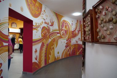KOLOMYIA, UKRAINE, AUGUST 20, 2022: People inside Pysanka Museum, painted Easter egg, which is part of National Museum of Hutsulshchyna and Pokuttya Folk Art, western Ukrainian city of Kolomyia
