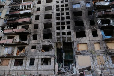 KYIV, UKRAINE, APRIL 15, 2022: After bombing. Russian terrorist army destroyed by shell dwelling house on Obolon district in Kyiv on March 2022. War in Ukraine. Terror and genocide of Ukrainian people