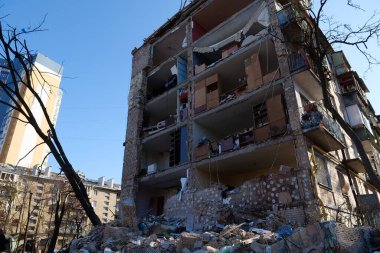 KYIV, UKRAINE, MARCH 20, 2022: After bombing. Russian terrorist army dropped missile and destroyed house in residential district in Kyiv city on March 18, 2022. Terror and genocide of Ukrainian people
