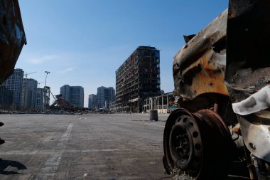 KYIV, UKRAINE, APRIL 15, 2022: Cars burned by russian missile. Missile destroyed shopping center Retroville on March 20. Terror and genocide of Ukrainian people. Russia - state of sponsor of terrorism