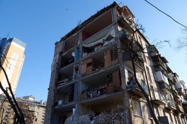 KYIV, UKRAINE, MARCH 20, 2022: After bombing. Russian terrorist army dropped missile and destroyed house in residential district in Kyiv city on March 18, 2022. Terror and genocide of Ukrainian people