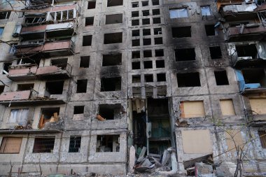 KYIV, UKRAINE, APRIL 15, 2022: After bombing. Russian terrorist army destroyed by shell dwelling house on Obolon district in Kyiv on March 2022. War in Ukraine. Terror and genocide of Ukrainian people