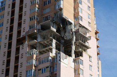 KYIV, UKRAINE, MAY 11, 2022: Russian missile damaged multi-storey dwelling building in Kiev city on February 26, 2022. Russian aggression. War in Ukraine. Terror and genocide of Ukrainian people