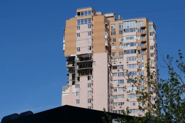 KYIV, UKRAINE, MAY 11, 2022: Russian missile damaged multi-storey dwelling building in Kiev city on February 26, 2022. Russian aggression. War in Ukraine. Terror and genocide of Ukrainian people