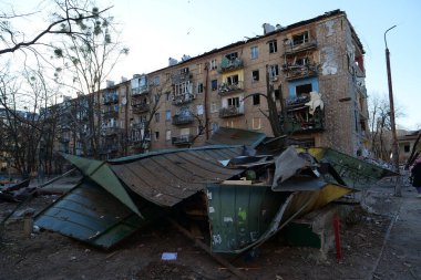 UKRAINE, KYIV, MARCH 20, 2022: Russian missile destroyed houses and garages in residential area in Kyiv city on March 18, 2022. After bombing, war in Ukraine, terror and genocide of Ukrainian people