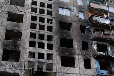 KYIV, UKRAINE, APRIL 15, 2022: After bombing. Russian terrorist army destroyed by shell dwelling house on Obolon district in Kyiv on March 2022. War in Ukraine. Terror and genocide of Ukrainian people