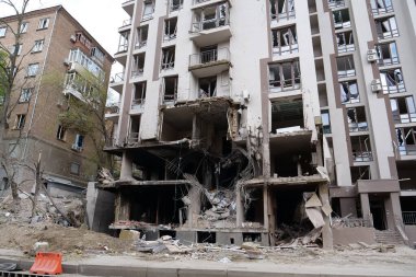 KYIV, UKRAINE, APRIL 29, 2022: After bombing. Dwelling house destroyed by russian missile in Kyiv city on end of April 2022. Russian aggression. War in Ukraine. Terror and genocide of Ukrainian people
