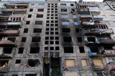 KYIV, UKRAINE, APRIL 15, 2022: After bombing. Russian terrorist army destroyed by shell dwelling house on Obolon district in Kyiv on March 2022. War in Ukraine. Terror and genocide of Ukrainian people