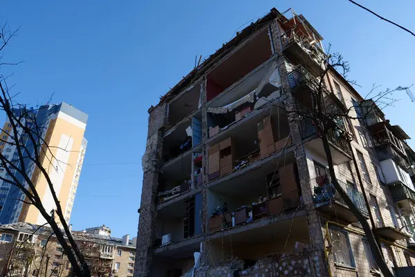 KYIV, UKRAINE, MARCH 20, 2022: After bombing. Russian terrorist army dropped missile and destroyed house in residential district in Kyiv city on March 18, 2022. Terror and genocide of Ukrainian people
