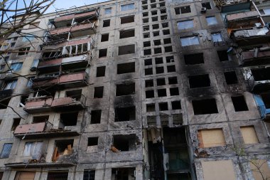 KYIV, UKRAINE, APRIL 15, 2022: After bombing. Russian terrorist army destroyed by shell dwelling house on Obolon district in Kyiv on March 2022. War in Ukraine. Terror and genocide of Ukrainian people
