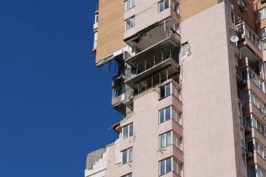 KYIV, UKRAINE, MAY 11, 2022: Russian missile damaged multi-storey dwelling building in Kiev city on February 26, 2022. Russian aggression. War in Ukraine. Terror and genocide of Ukrainian people