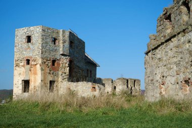 Stone tower in Pniv Castle - medieval historical object in Ivano-Frankivsk region of western Ukraine