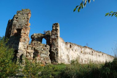 Ancient stone towers in Pniv Castle - medieval historical object in Ivano-Frankivsk region of western Ukraine