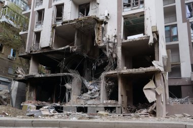 KYIV, UKRAINE, APRIL 29, 2022: After bombing. Dwelling house destroyed by russian missile in Kyiv city on end of April 2022. Russian aggression. War in Ukraine. Terror and genocide of Ukrainian people