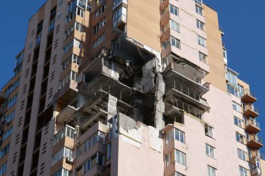 KYIV, UKRAINE, MAY 11, 2022: Russian missile damaged multi-storey dwelling building in Kiev city on February 26, 2022. Russian aggression. War in Ukraine. Terror and genocide of Ukrainian people