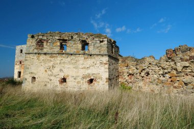Stone tower in Pniv Castle - medieval historical object in Ivano-Frankivsk region of western Ukraine