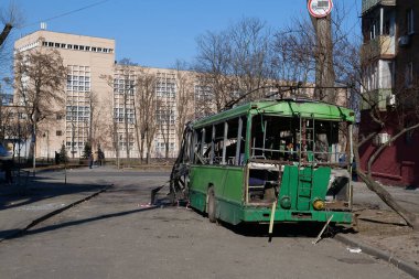 KYIV, UKRAINE, MARCH 20, 2022: After bombing. War in Ukraine. Russian missile destroyed trolleybus in Kyiv city on March 14, 2022. Terror and genocide of Ukrainian people